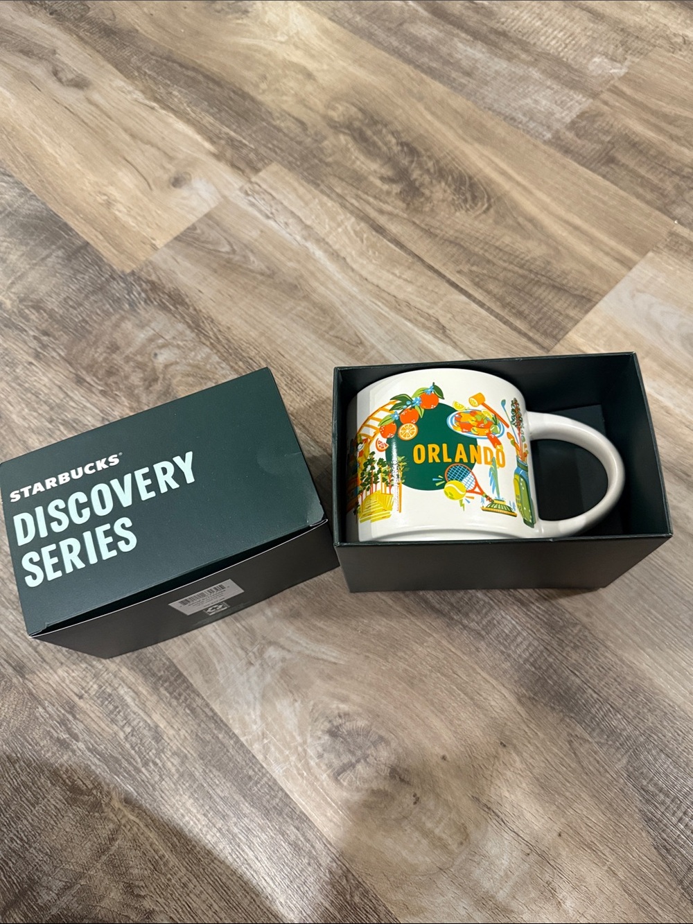 Starbucks Orlando White Ceramic Mug with Orange and Green Accents